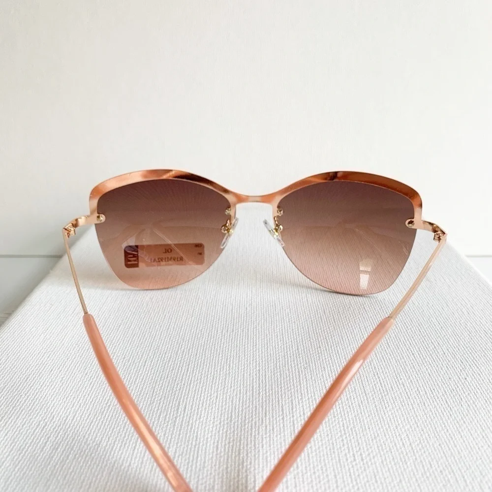 NWT pink and rose gold semi rimless sunglasses